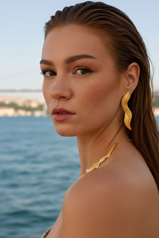 Dotted golden wave earrings