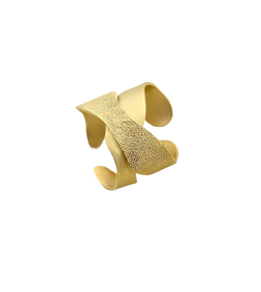 Crossed dotted ring