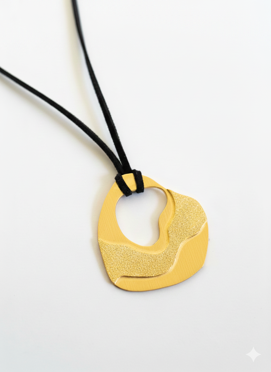 Black suede with gold pendant